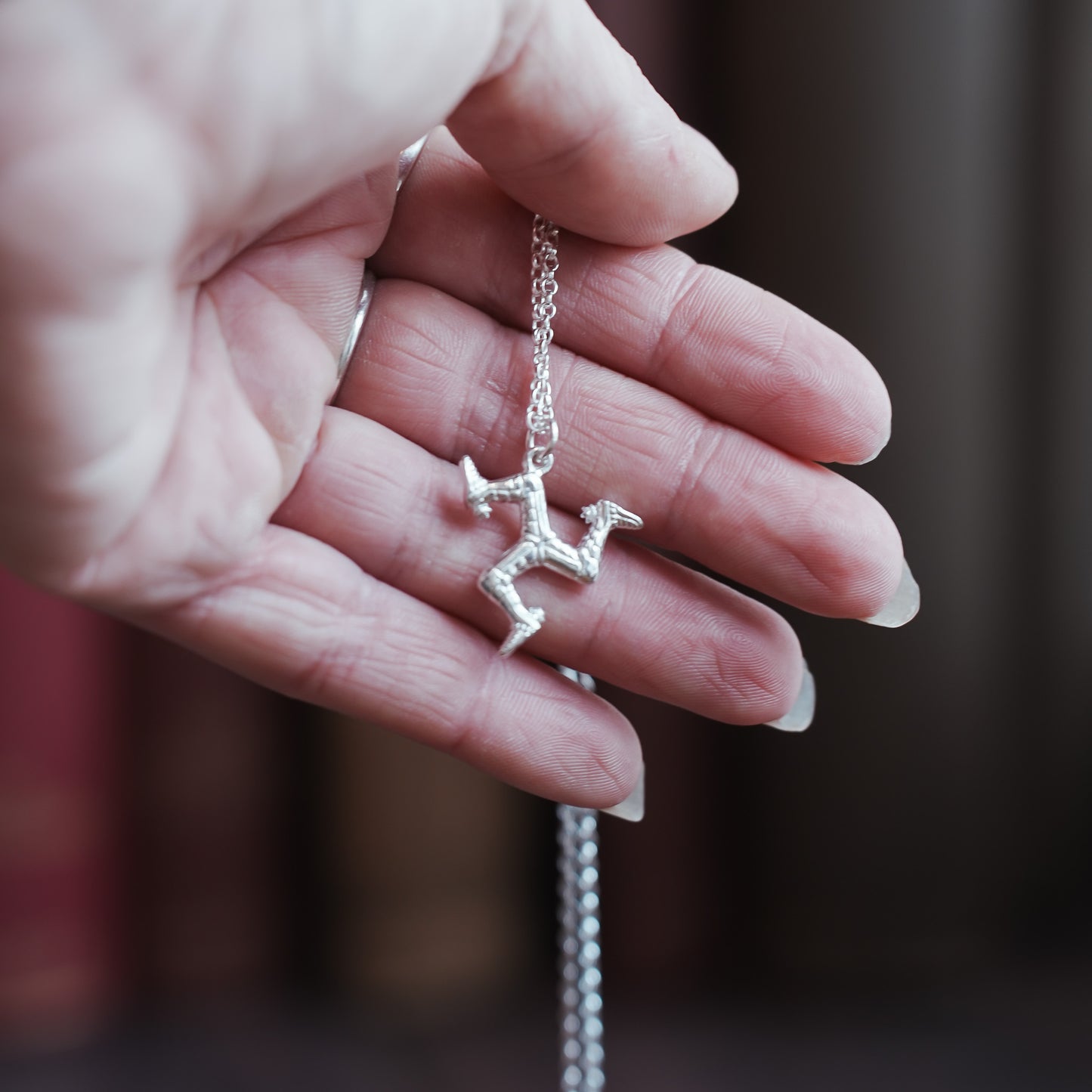 Three Legs of Man Sterling Silver Pendant Necklace