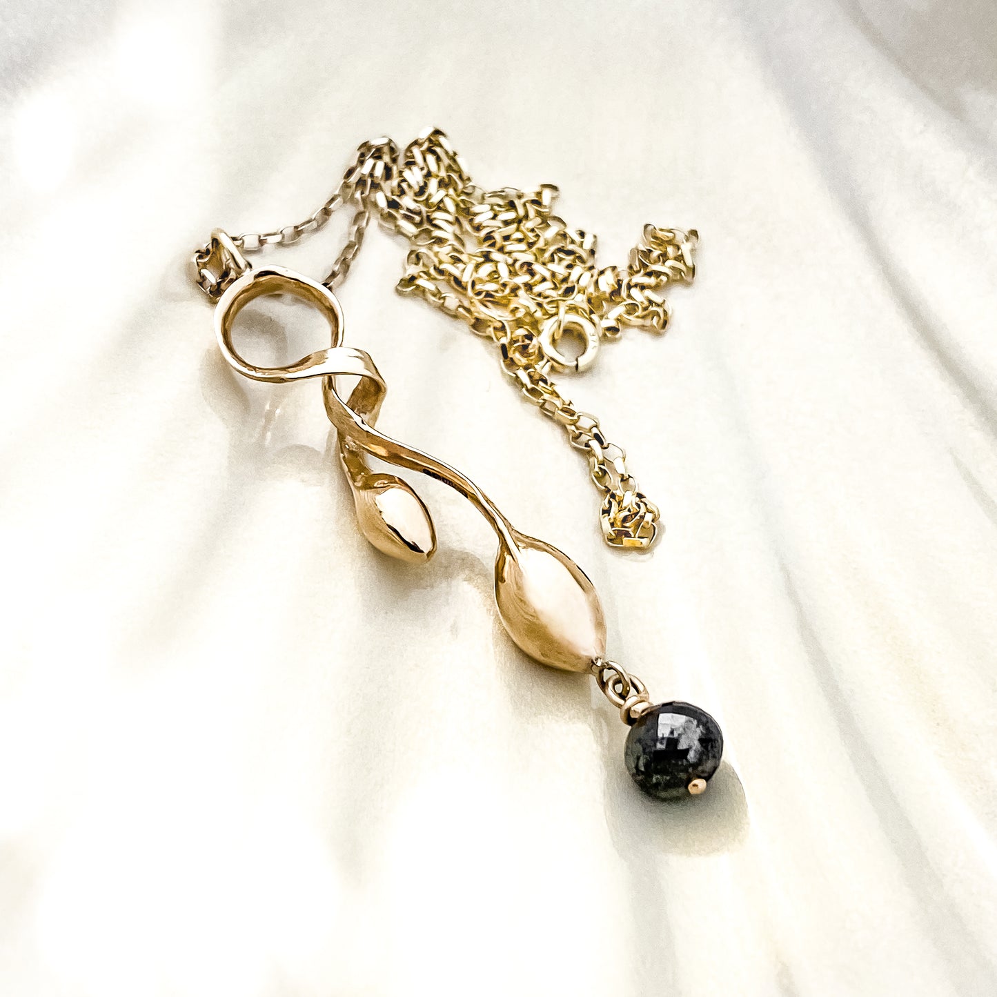 Gold Seaweed Pendant Necklace with Black Diamond