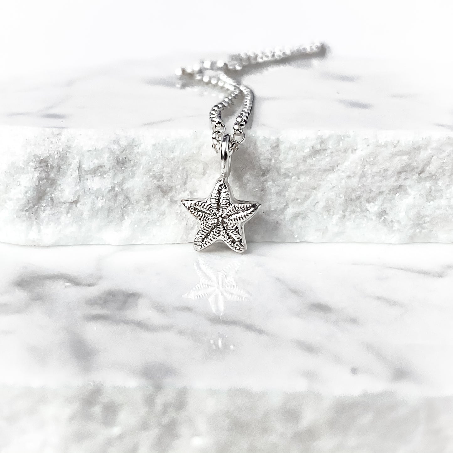 Sterling Silver Tiny Crinoid Star Fossil Necklace
