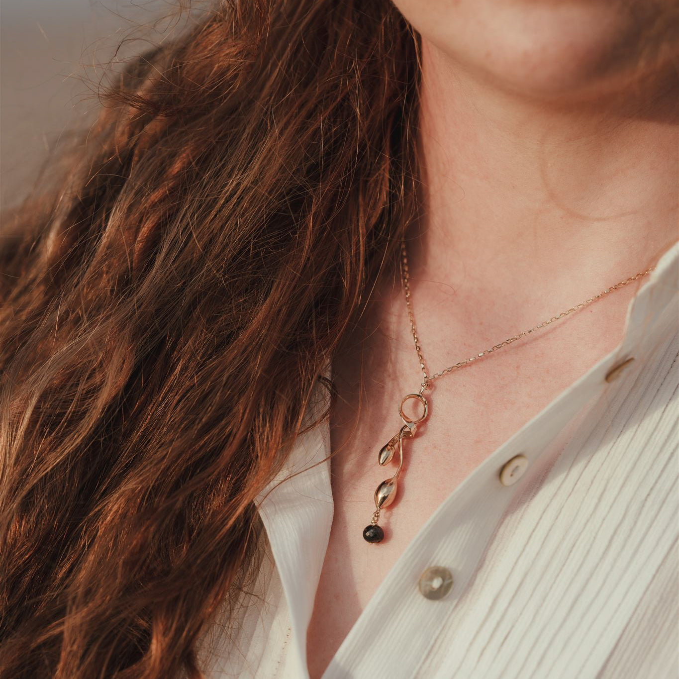 Gold Seaweed Pendant Necklace with Black Diamond