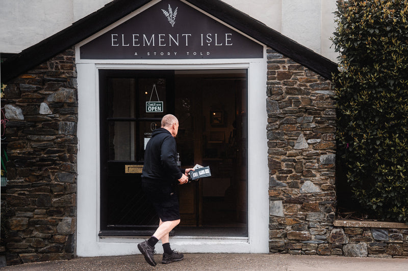 A Postman delivering mail on the Isle of Man