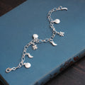 Dark Skies Moon and Stars Sterling Silver Charm Bracelet