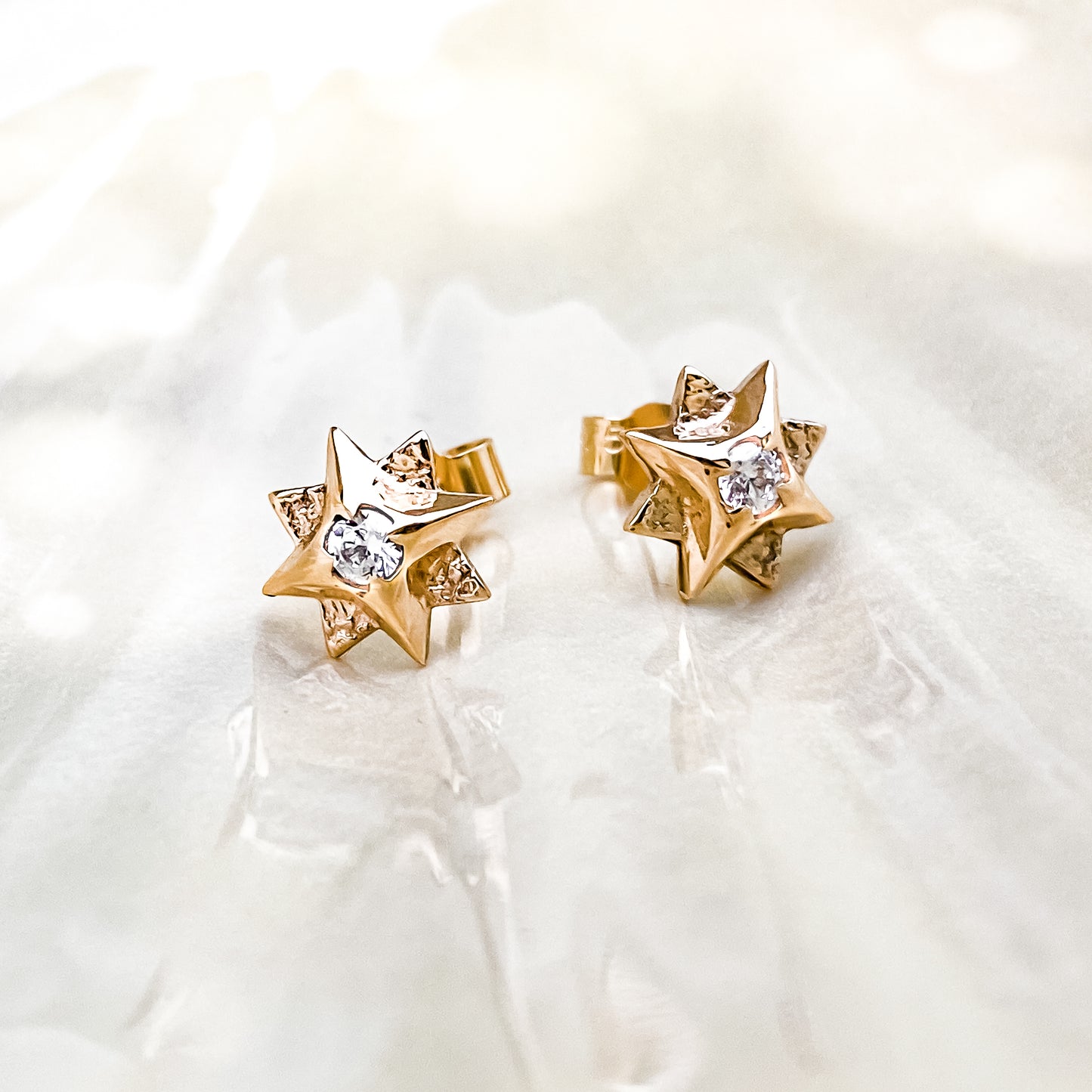 Gold North Star Stud Earrings with Moissanite