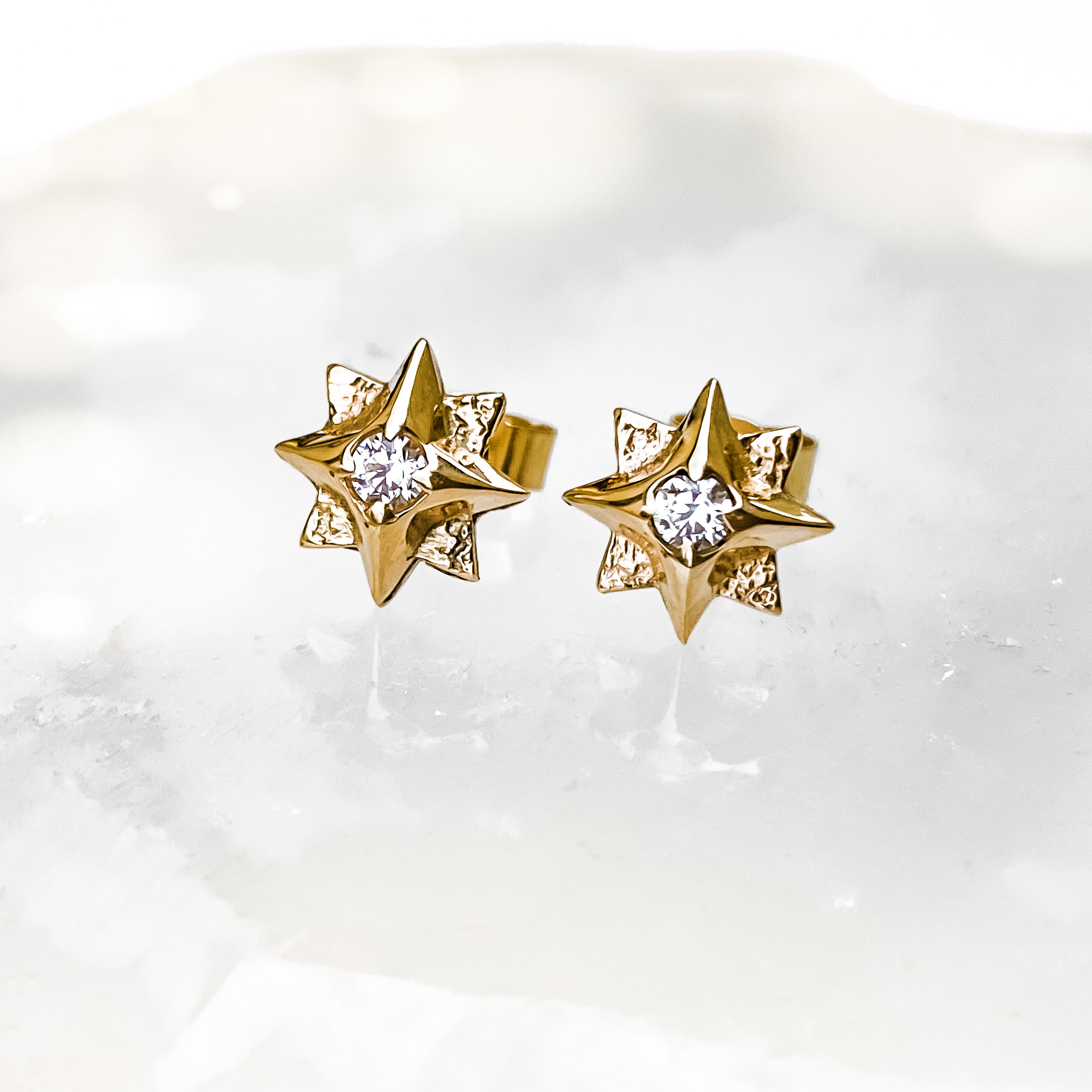 Gold North Star Stud Earrings with Moissanite