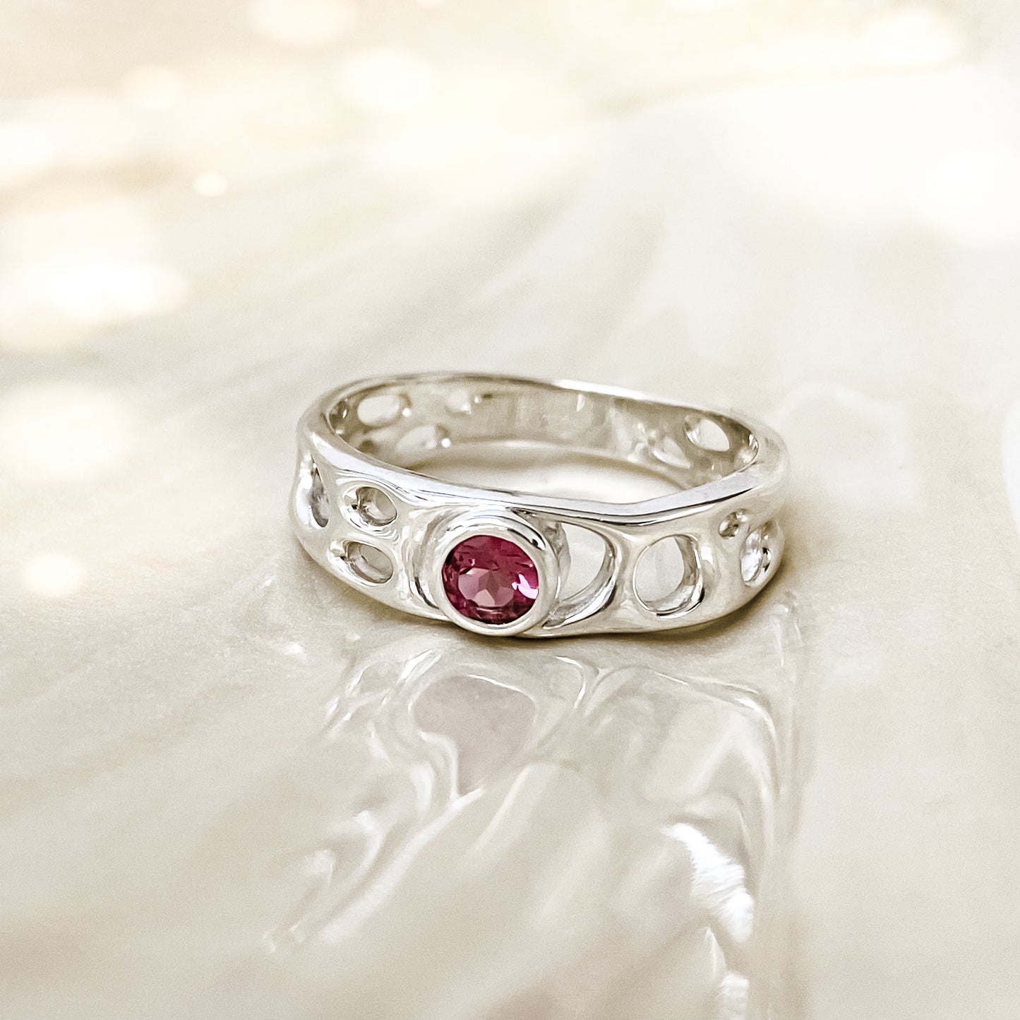 Sterling Silver Infinity Ring with Pink Tourmaline