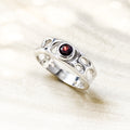 Sterling Silver Infinity Ring with Garnet