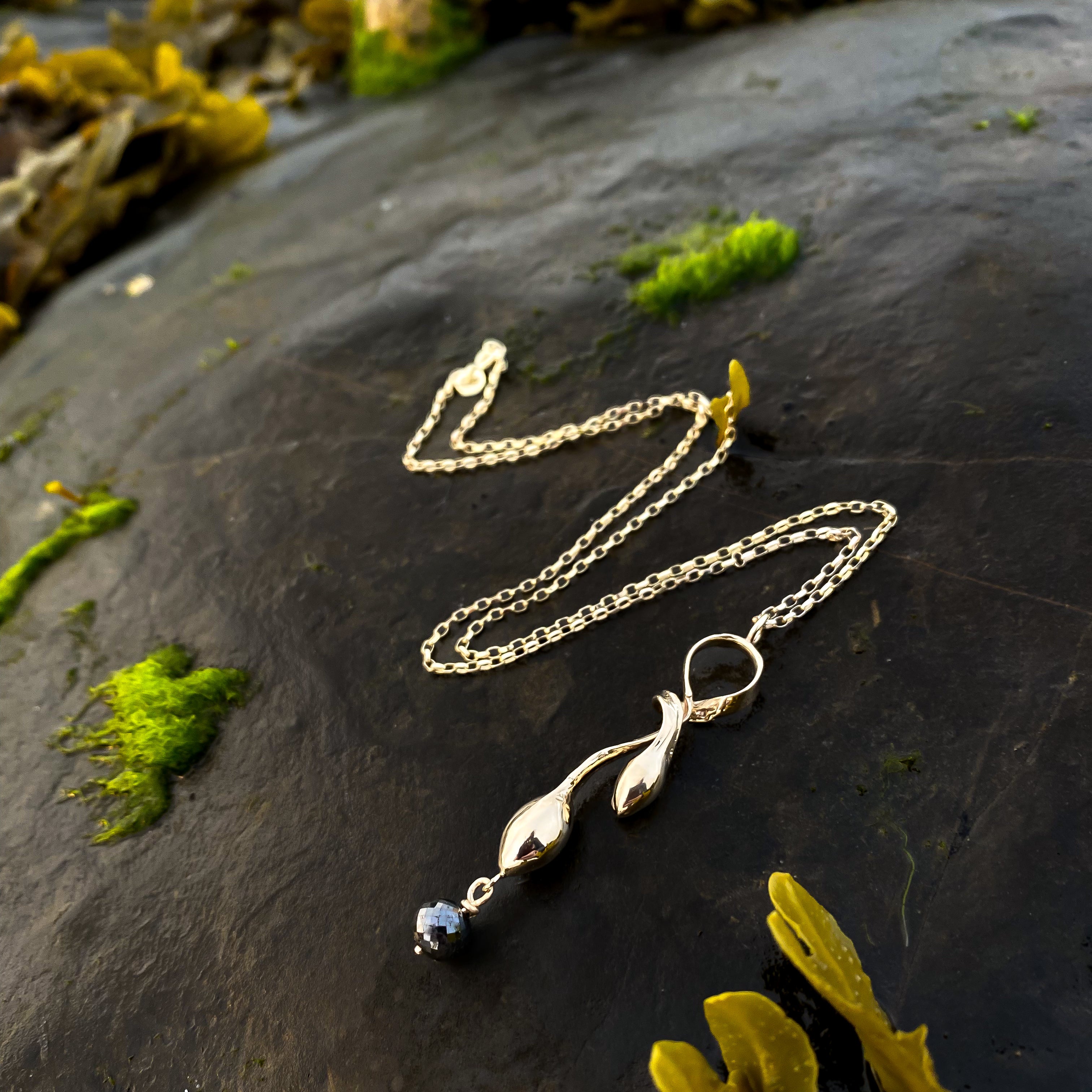 Gold Seaweed Pendant Necklace with Black Diamond
