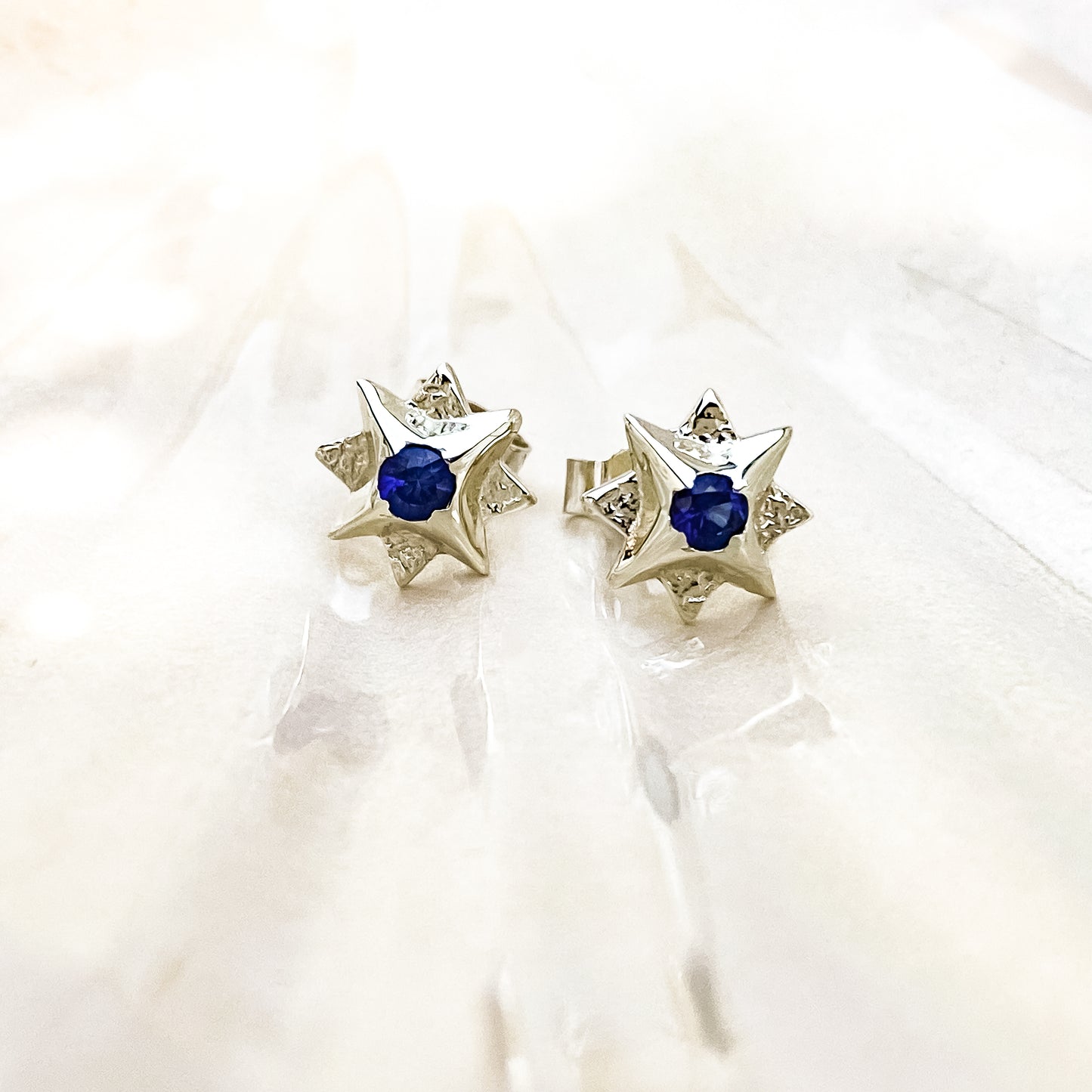 White Gold North Star Stud Earrings with Sapphire