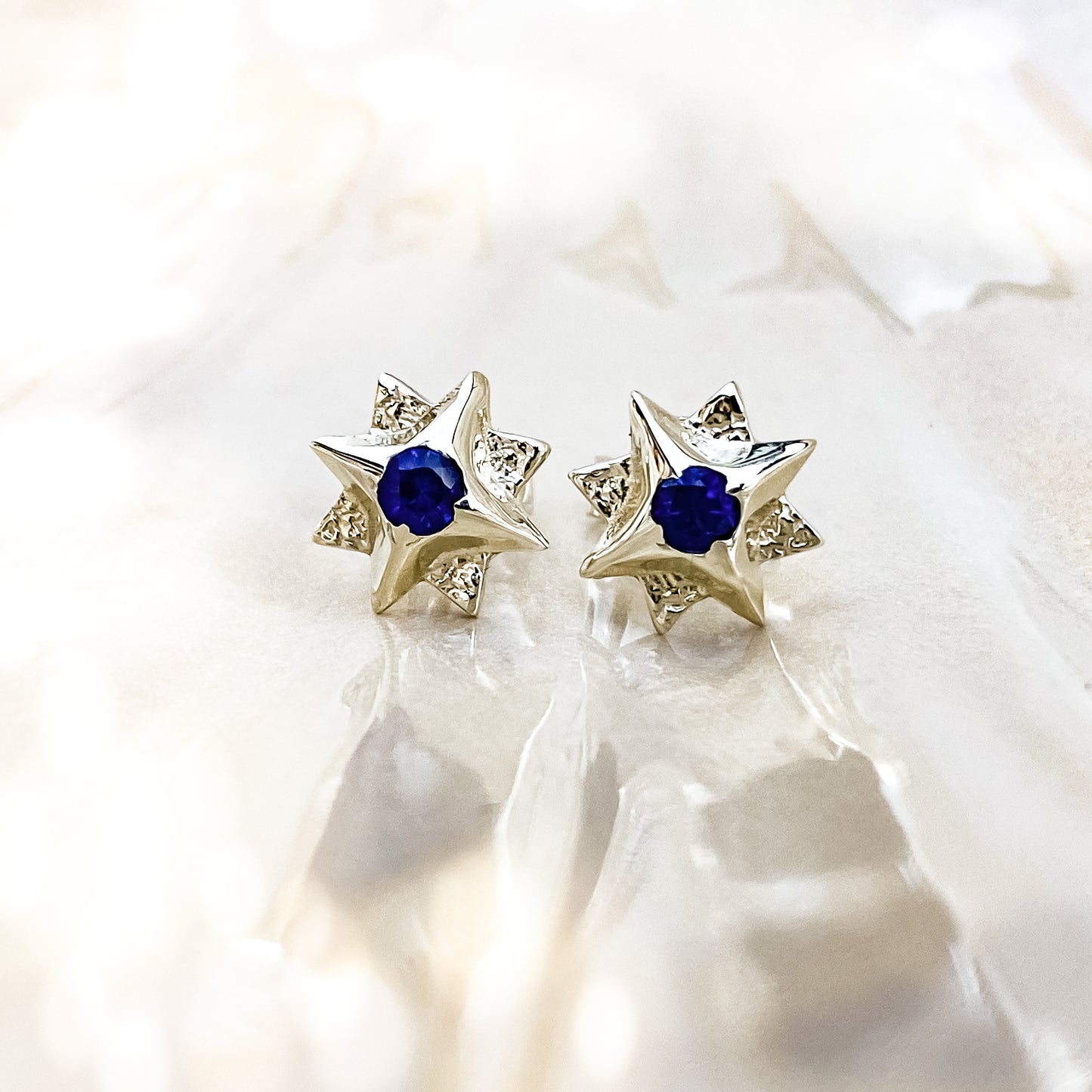 White Gold North Star Stud Earrings with Sapphire