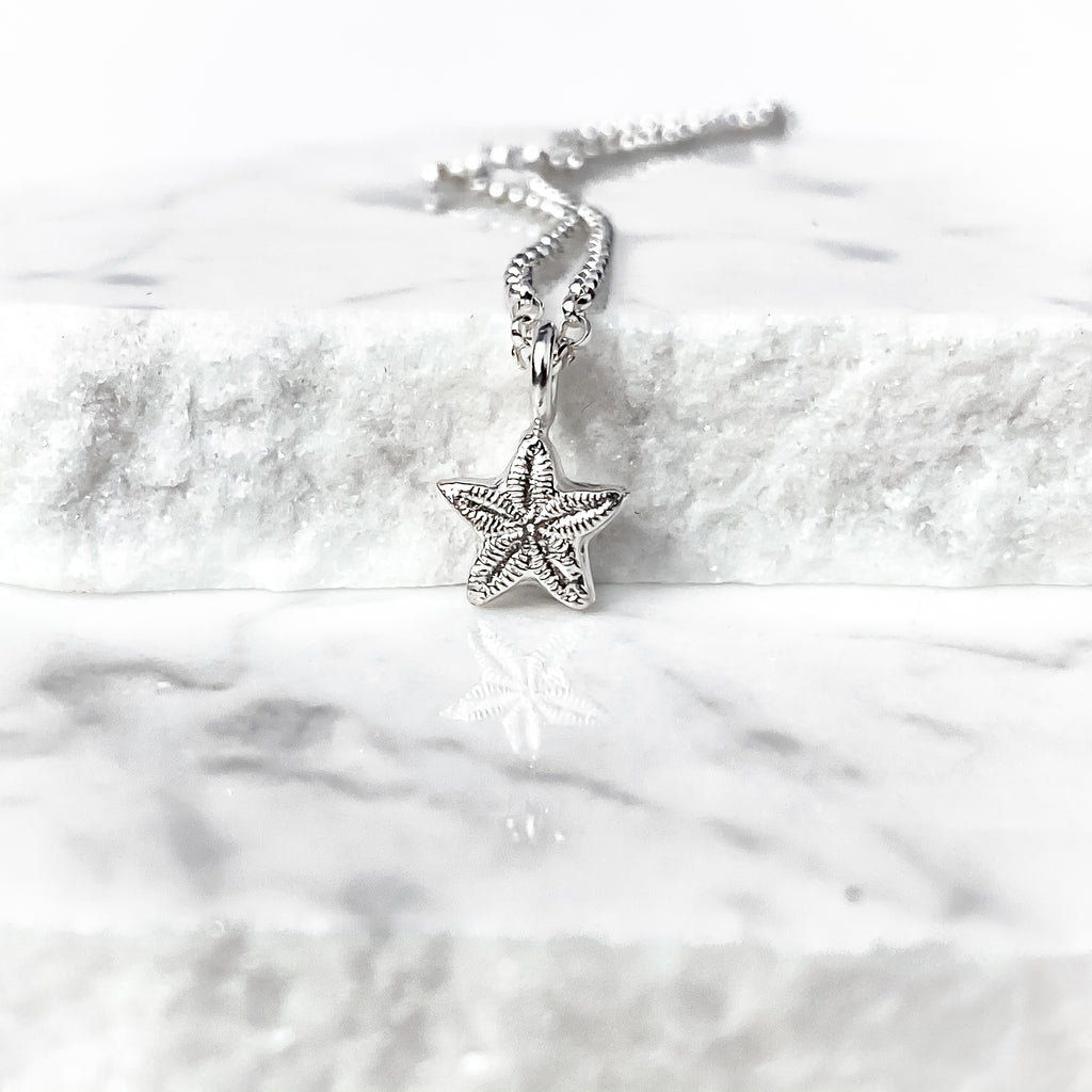 Sterling Silver Tiny Crinoid Star Fossil Necklace