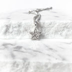 Sterling Silver Tiny Crinoid Star Fossil Necklace