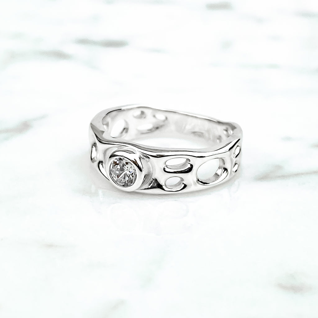 Sterling Silver Infinity Ring with White Topaz