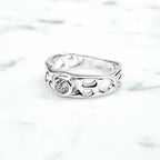 Sterling Silver Infinity Ring with White Topaz