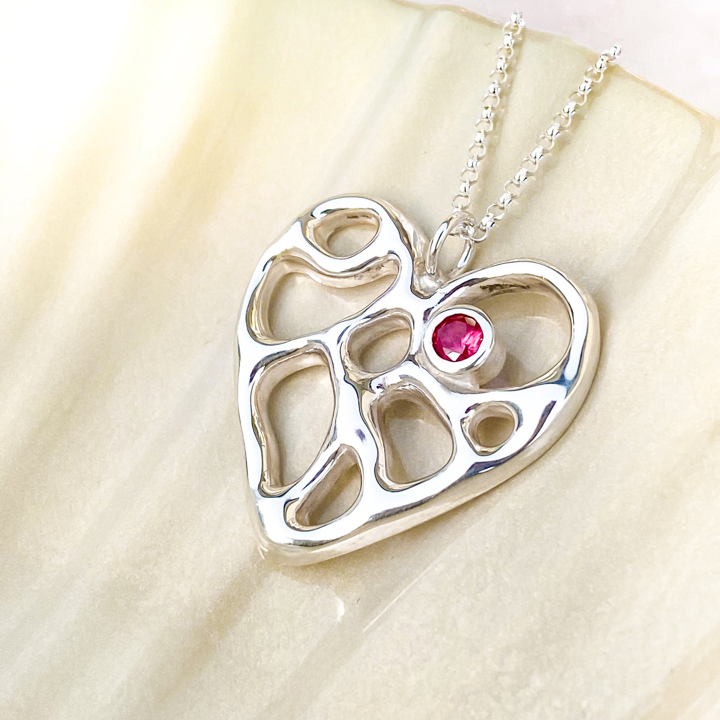 Silver Infinity Heart Necklace with Ruby Corundum
