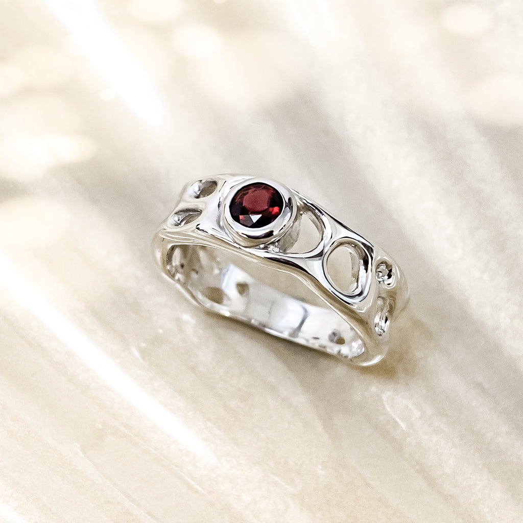 Sterling Silver Infinity Ring with Garnet
