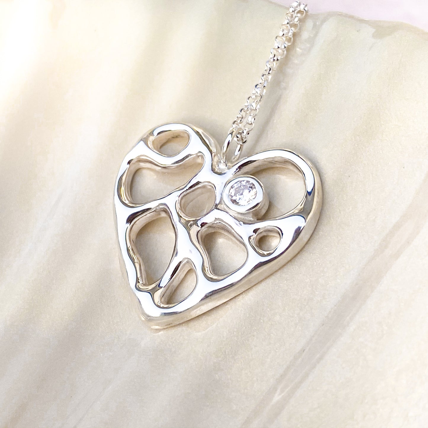 Silver Infinity Heart Necklace with White Topaz